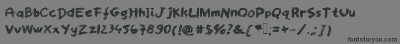 Worstpaintjobever-Schriftart – Schwarze Schriften auf grauem Hintergrund