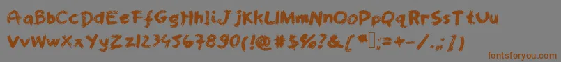 フォントWorstpaintjobever – 茶色の文字が灰色の背景にあります。