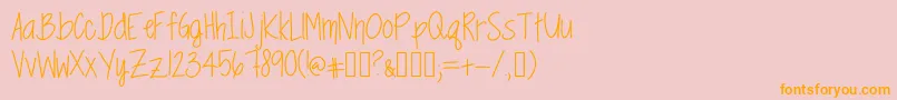 フォントSpringtimeBlues – オレンジの文字がピンクの背景にあります。