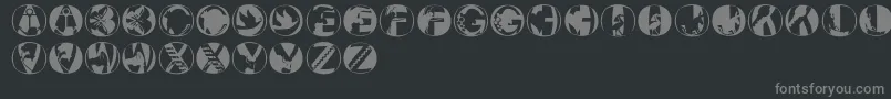 Pixcapsround-fontti – harmaat kirjasimet mustalla taustalla