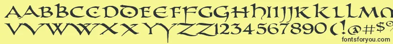 PrUncialAltCapsExtended-fontti – mustat fontit keltaisella taustalla
