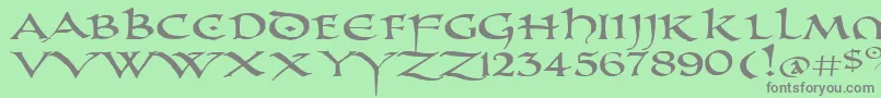 PrUncialAltCapsExtended-Schriftart – Graue Schriften auf grünem Hintergrund