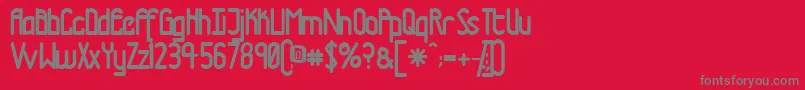 Fonte Tmtrn – fontes cinzas em um fundo vermelho