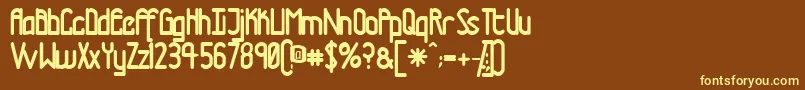 Tmtrn-fontti – keltaiset fontit ruskealla taustalla