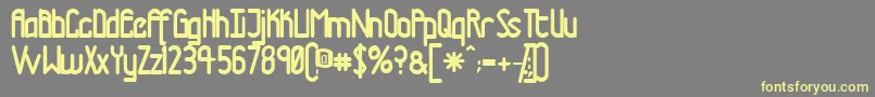 Tmtrn-fontti – keltaiset fontit harmaalla taustalla