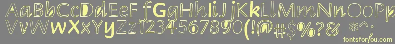 Peekaboo2 Font – Yellow Fonts on Gray Background