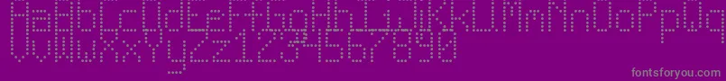 NewLedBoardTfb-Schriftart – Graue Schriften auf violettem Hintergrund