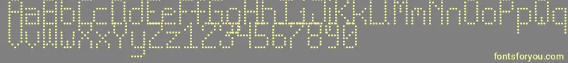 フォントNewLedBoardTfb – 黄色のフォント、灰色の背景