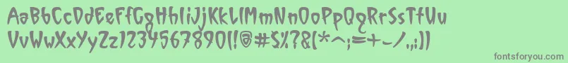VinylItcTt Font – Gray Fonts on Green Background