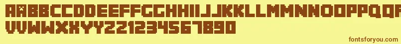 Minecrafter.Reg Font – Brown Fonts on Yellow Background