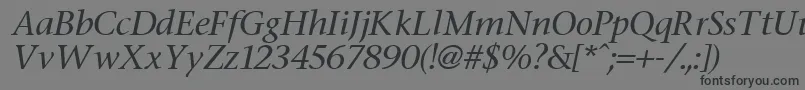 FasseItalic-fontti – mustat fontit harmaalla taustalla