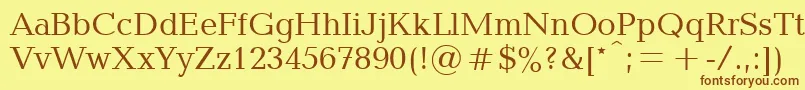 フォントBlt55C – 茶色の文字が黄色の背景にあります。