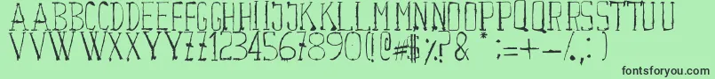 フォントCourwette – 緑の背景に黒い文字