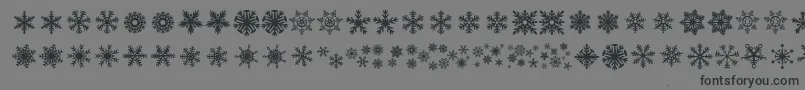 DhSnowflakes-Schriftart – Schwarze Schriften auf grauem Hintergrund