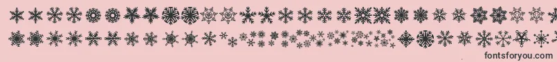 DhSnowflakes-Schriftart – Schwarze Schriften auf rosa Hintergrund