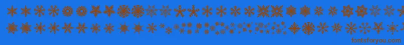 DhSnowflakes Font – Brown Fonts on Blue Background