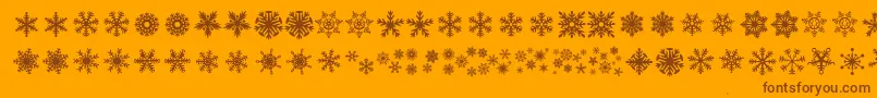 Шрифт DhSnowflakes – коричневые шрифты на оранжевом фоне