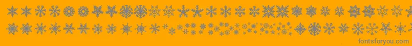 DhSnowflakes-Schriftart – Graue Schriften auf orangefarbenem Hintergrund