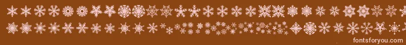 DhSnowflakes-Schriftart – Rosa Schriften auf braunem Hintergrund