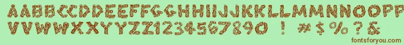 Blacksplinters Font – Brown Fonts on Green Background