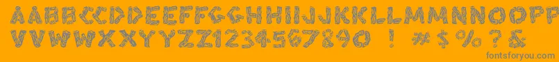 Blacksplinters Font – Gray Fonts on Orange Background