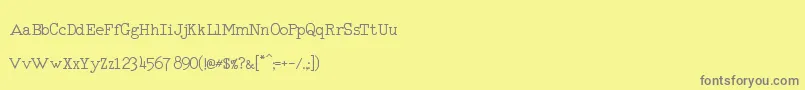 RmTyperighterMedium Font – Gray Fonts on Yellow Background