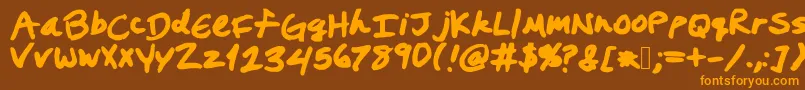 フォントPrestonswriting – オレンジ色の文字が茶色の背景にあります。