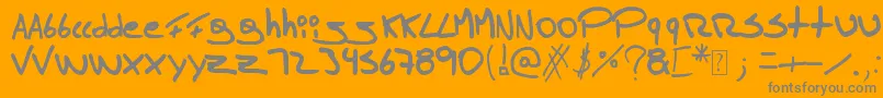 Tomasmassu-Schriftart – Graue Schriften auf orangefarbenem Hintergrund