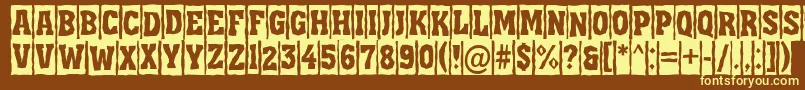 Assua11-fontti – keltaiset fontit ruskealla taustalla