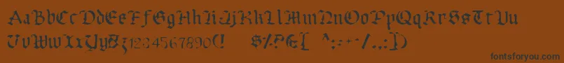 UberhГ¶lmeLight Font – Black Fonts on Brown Background