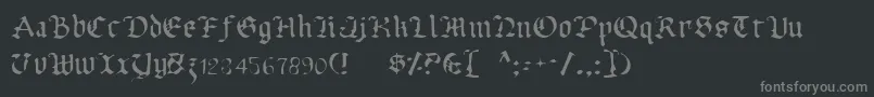 Fonte UberhГ¶lmeLight – fontes cinzas em um fundo preto