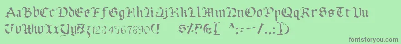 Fonte UberhГ¶lmeLight – fontes cinzas em um fundo verde