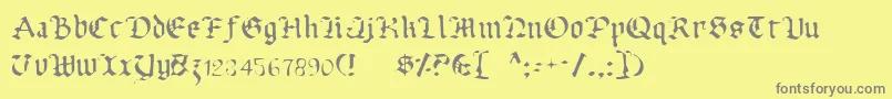 UberhГ¶lmeLight-fontti – harmaat kirjasimet keltaisella taustalla