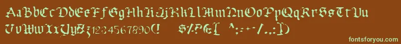 フォントUberhГ¶lmeLight – 緑色の文字が茶色の背景にあります。