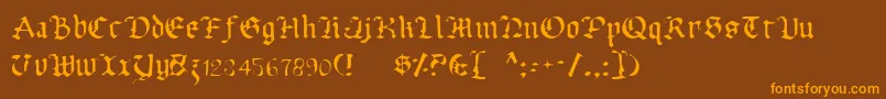 UberhГ¶lmeLight Font – Orange Fonts on Brown Background