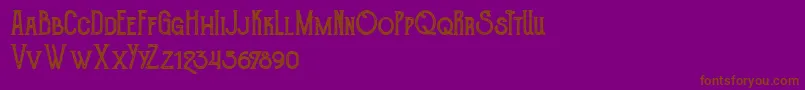Fonte TheGoldsmithVintage – fontes marrons em um fundo roxo