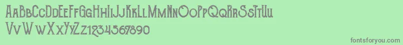 TheGoldsmithVintage-Schriftart – Graue Schriften auf grünem Hintergrund