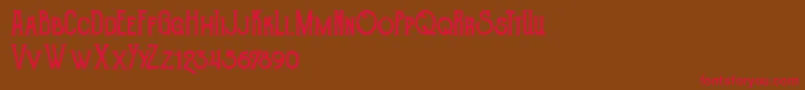 TheGoldsmithVintage Font – Red Fonts on Brown Background