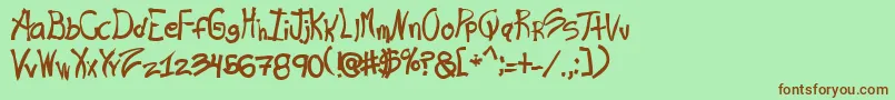 Ras Font – Brown Fonts on Green Background