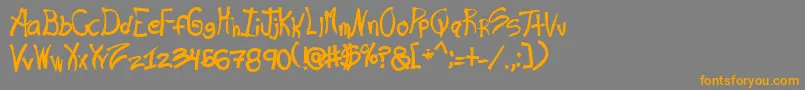 フォントRas – オレンジの文字は灰色の背景にあります。