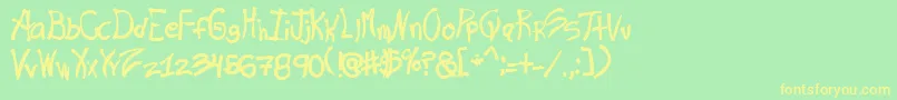 Ras Font – Yellow Fonts on Green Background