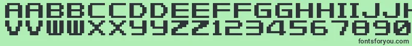 FZeroGbaText1-fontti – mustat fontit vihreällä taustalla