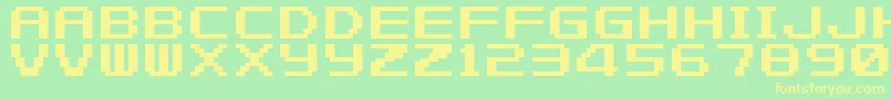 FZeroGbaText1-Schriftart – Gelbe Schriften auf grünem Hintergrund