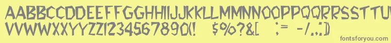Larousse Font – Gray Fonts on Yellow Background