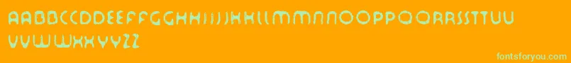 Tourdfnt Font – Green Fonts on Orange Background