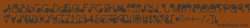 Skinnynavigator Font – Black Fonts on Brown Background
