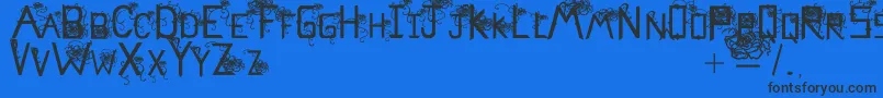 Flowerscube-Schriftart – Schwarze Schriften auf blauem Hintergrund