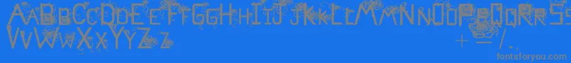 Flowerscube-Schriftart – Graue Schriften auf blauem Hintergrund