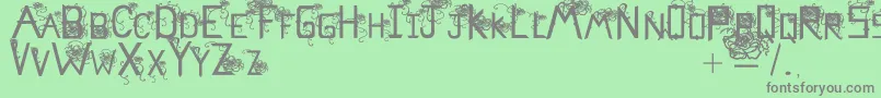 Flowerscube Font – Gray Fonts on Green Background