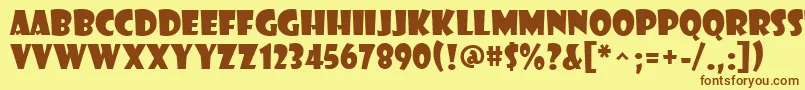 フォントShowcardGothic – 茶色の文字が黄色の背景にあります。